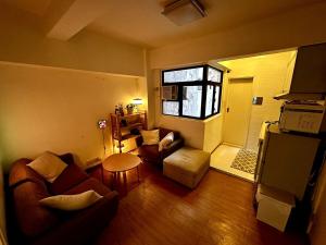 Kuchyň nebo kuchyňský kout v ubytování Cozy flat in Hong Kong