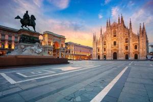 a statue of a man on a horse in front of a building at La Divina Mansarda di Milano in Vittuone