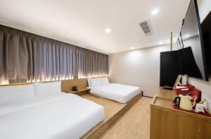 Μια τηλεόραση ή/και κέντρο ψυχαγωγίας στο Gwangju Cheomdan Hotel