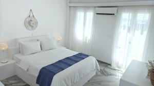 Postel nebo postele na pokoji v ubytování Narges Hotel