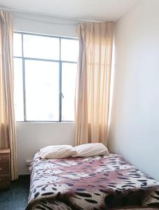 Postel nebo postele na pokoji v ubytování Hostal wayki + 19 fotografií