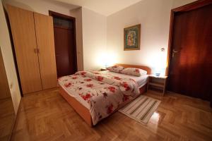 Postel nebo postele na pokoji v ubytování Apartment Đakovo