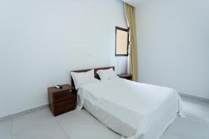 Giường trong phòng chung tại Lumineux T3 à la 8e tranche