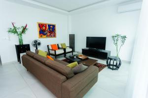 TV/trung tâm giải trí tại Lumineux T3 à la 8e tranche