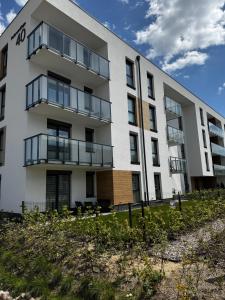 Budova, kde se apartmán nachází + 3 fotografie