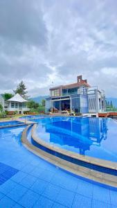 Sundlaugin á De Pointé Resort & Resto eða í nágrenninu