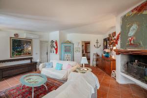 Postel nebo postele na pokoji v ubytování [Villa di Lusso Porto Cervo Pantogia]con Giardino + 35 fotografií