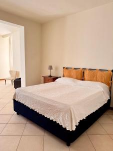 Postel nebo postele na pokoji v ubytování Residence Montefiore