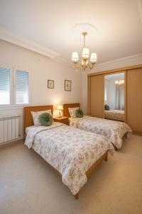 Postel nebo postele na pokoji v ubytování Residence Amira