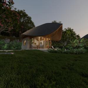 a small house with a pitched roof on a lawn at Mandala Eco Resort Lombok in Selong Belanak