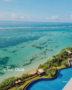 an aerial view of the beach and the ocean at MODERN 2 BEDROOM LAVAYA OAKWOOD APARTMENT, Nusa Dua in Nusa Dua