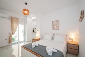 Llit o llits en una habitació de Asterashouse 2