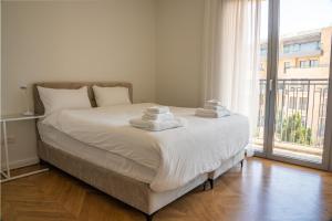 Letto o letti in una camera di Hematian Hotel by Effy