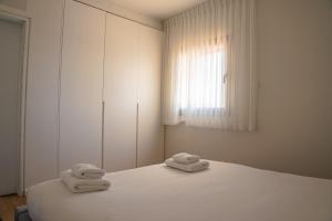 Letto o letti in una camera di Hematian Hotel by Effy