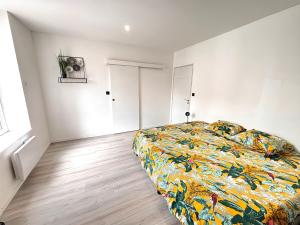 Ένα ή περισσότερα κρεβάτια σε δωμάτιο στο Urban Chic Studio 10 min de la gare