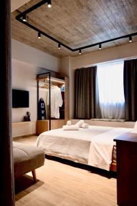 Postel nebo postele na pokoji v ubytování African Adventure Apartment