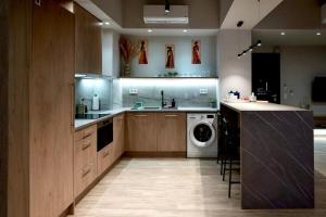 Kuchyň nebo kuchyňský kout v ubytování African Adventure Apartment + 13 fotografií