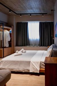 Postel nebo postele na pokoji v ubytování African Adventure Apartment