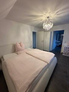Postel nebo postele na pokoji v ubytování Ferienwohnung JODIS