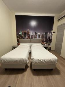A bed or beds in a room at Hotel Giardinetto Al Sant'Orsola