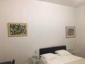 Giường trong phòng chung tại Domus Hotel