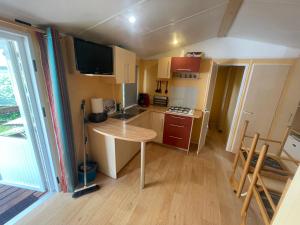 Kuchyň nebo kuchyňský kout v ubytování Mobil Home, S4, Turner