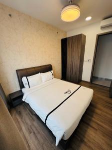 Postel nebo postele na pokoji v ubytování Agile TRX Luxury suite Bukit bintang