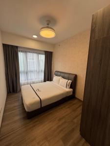 Postel nebo postele na pokoji v ubytování Agile TRX Luxury suite Bukit bintang
