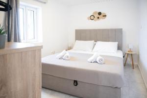 Postel nebo postele na pokoji v ubytování Cycladic House Naxos