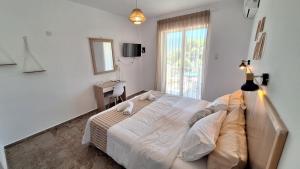 Photo de la galerie de l'établissement Evita's Resort, à Poros