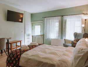 Postel nebo postele na pokoji v ubytování Patriko Guesthouse Ioannina