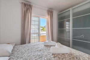 Postel nebo postele na pokoji v ubytování Casa do Rei - Charneca + 33 fotografií