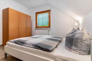 Postel nebo postele na pokoji v ubytování Haus Sum