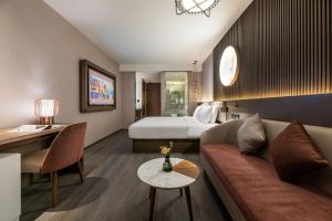 Xi 'an North Railway Station Municipal Government Orange Crystal Hotel客房内的一张或多张床位