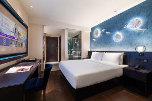 Xi 'an North Railway Station Municipal Government Orange Crystal Hotel客房内的一张或多张床位
