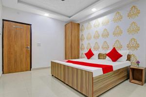 Postel nebo postele na pokoji v ubytování Hotel O Check Inn + 22 fotografií