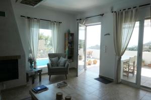 Χώρος καθιστικού στο Thalassa Villa