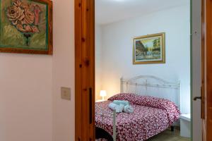 A bed or beds in a room at Casa vacanze Patrizia