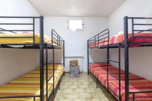 A bed or beds in a room at Casa vacanze Patrizia