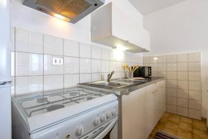 A kitchen or kitchenette at Casa vacanze Patrizia