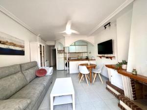 TV a/nebo společenská místnost v ubytování La Mata Apartment