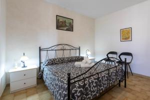 A bed or beds in a room at Casa vacanze Patrizia