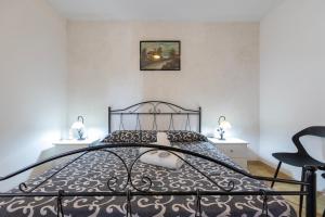 A bed or beds in a room at Casa vacanze Patrizia