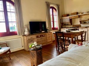 TV a/nebo společenská místnost v ubytování La Torretta