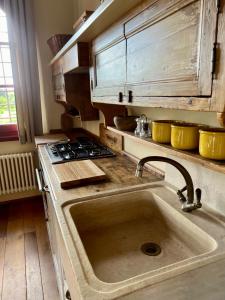 Kuchyň nebo kuchyňský kout v ubytování La Torretta