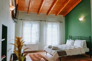 Postel nebo postele na pokoji v ubytování Patriko Guesthouse Ioannina
