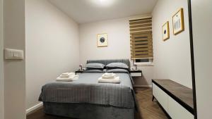 Ένα ή περισσότερα κρεβάτια σε δωμάτιο στο Apartment Bllok A