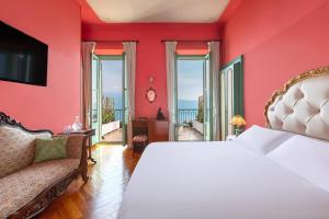 Postel nebo postele na pokoji v ubytování Boutique Hotel Villa Sostaga