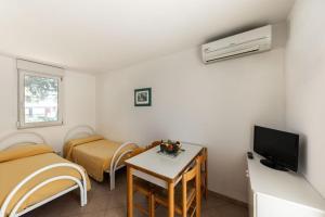 Μια τηλεόραση ή/και κέντρο ψυχαγωγίας στο Residence Camping Atlantide