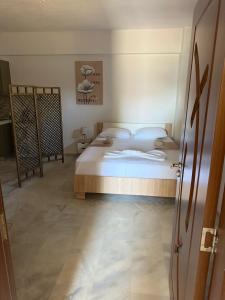 Postel nebo postele na pokoji v ubytování Villa Spartandom